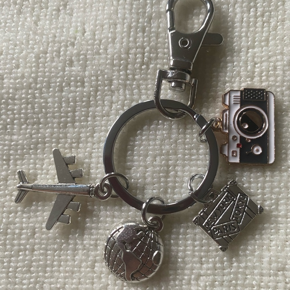 Silver Travel Charm Keychain with Airplane, Globe, Camera & Suitcase